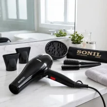 سشوار حرفه‌ای 2600 وات سانیل مدل STP-8803، موتور AC دارای سری متمرکز‌کننده باریک، متمرکز‌کننده پهن با ویژگی صاف‌کنندگی، حجم‌دهندگی، با قابلیت باد سرد